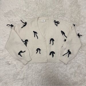 Elegant White Cardigan with Black Bow Details